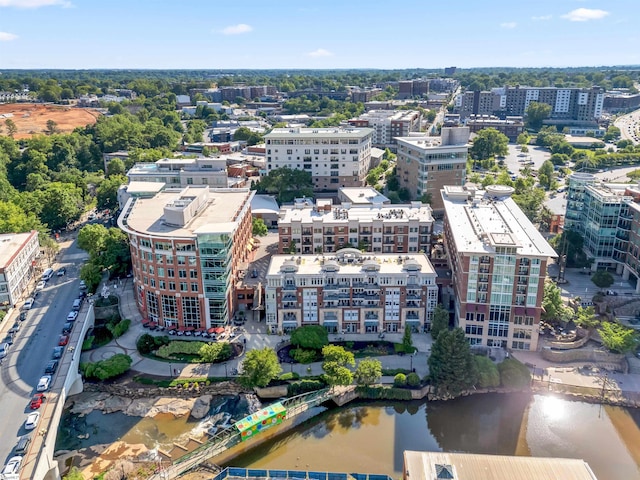 bird's eye view featuring a water view and a city view