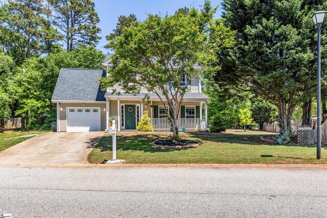 2 Susana Dr, Greer, SC 29651 - view of front of home featuring a garage, fence, a front yard, a porch, and driveway