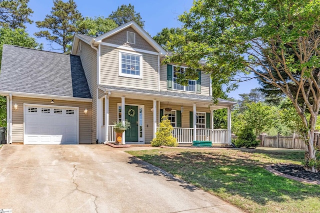 2 Susana Dr, Greer, SC 29651 - view of front of home featuring a garage, fence, covered porch, roof with shingles, and concrete driveway