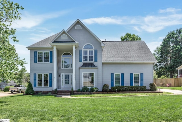 105 Chariot Ln, Simpsonville, SC 29681 - view of front facade with a shingled roof, a front lawn, and fence