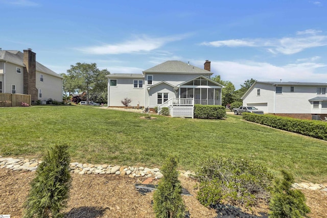 105 Chariot Ln, Simpsonville, SC 29681 - back of house featuring a lawn, a chimney, and a sunroom