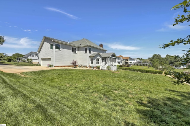105 Chariot Ln, Simpsonville, SC 29681 - view of property exterior with an attached garage, a yard, and driveway