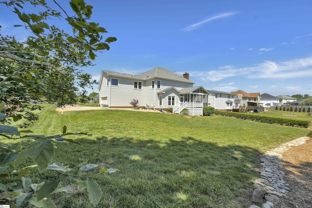 105 Chariot Ln, Simpsonville, SC 29681 - rear view of property featuring a sunroom and a yard