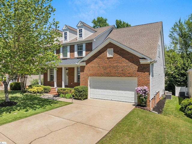 502 Kingsmoor Dr, Simpsonville, SC 29681 - view of front of house with brick siding, a garage, a front lawn, and concrete driveway