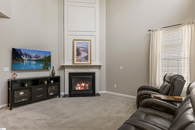 502 Kingsmoor Dr, Simpsonville, SC 29681 - living room with a fireplace with flush hearth, baseboards, and carpet flooring