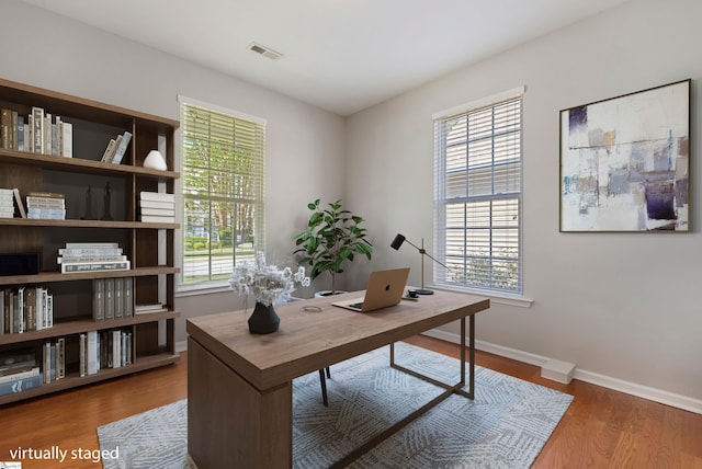 502 Kingsmoor Dr, Simpsonville, SC 29681 - home office featuring a wealth of natural light, wood finished floors, and visible vents