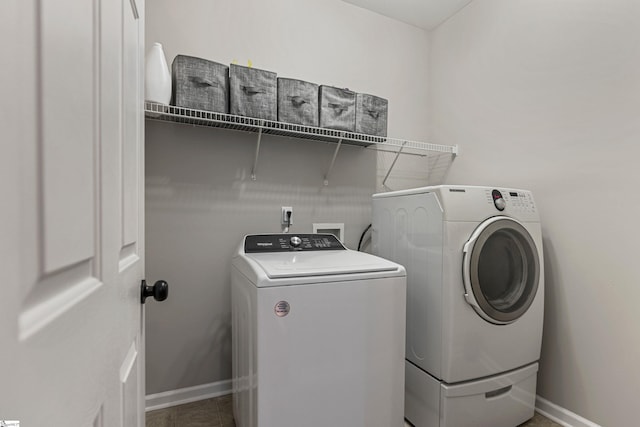 502 Kingsmoor Dr, Simpsonville, SC 29681 - laundry room with independent washer and dryer, laundry area, and baseboards