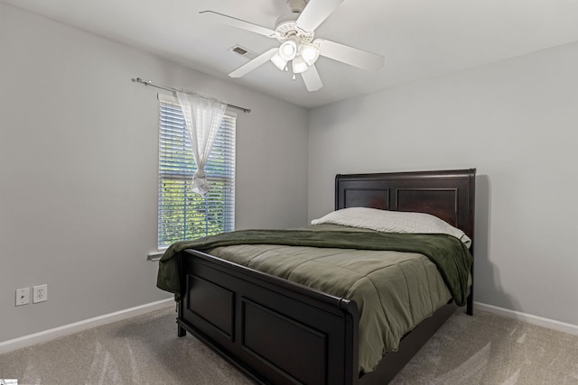 502 Kingsmoor Dr, Simpsonville, SC 29681 - bedroom with carpet floors, baseboards, visible vents, and ceiling fan