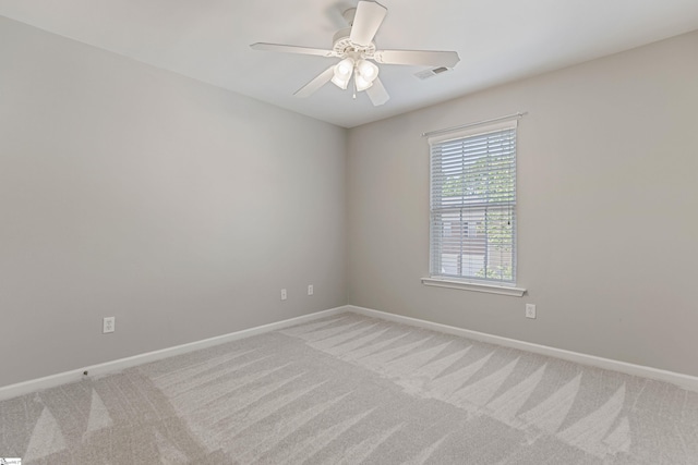 502 Kingsmoor Dr, Simpsonville, SC 29681 - spare room featuring baseboards, visible vents, a ceiling fan, and light colored carpet