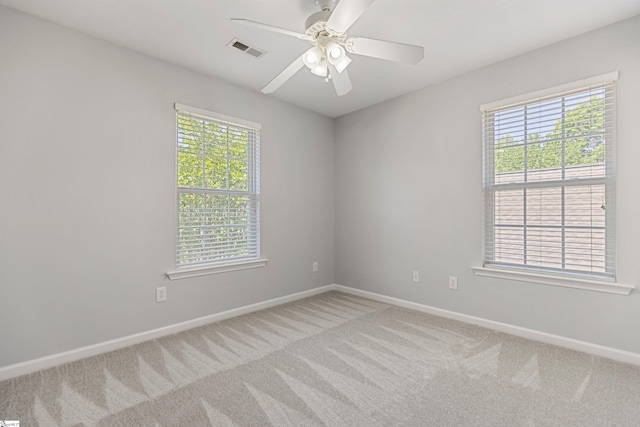 502 Kingsmoor Dr, Simpsonville, SC 29681 - empty room featuring visible vents, baseboards, plenty of natural light, and light carpet
