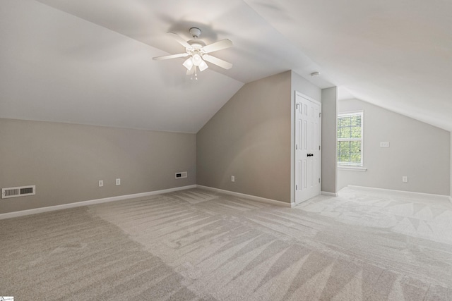 502 Kingsmoor Dr, Simpsonville, SC 29681 - additional living space with visible vents, a ceiling fan, vaulted ceiling, and light colored carpet