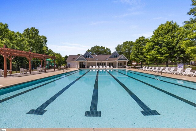 502 Kingsmoor Dr, Simpsonville, SC 29681 - community pool featuring a patio area, fence, and a pergola