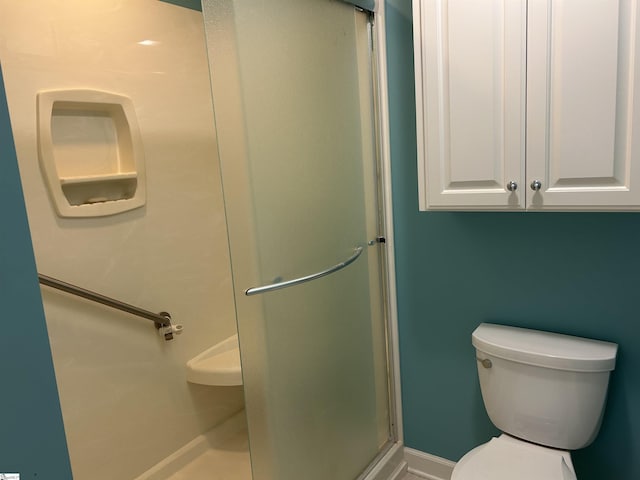 402 Chestnut St, Clinton, SC 29325 - full bath with toilet, baseboards, and a stall shower