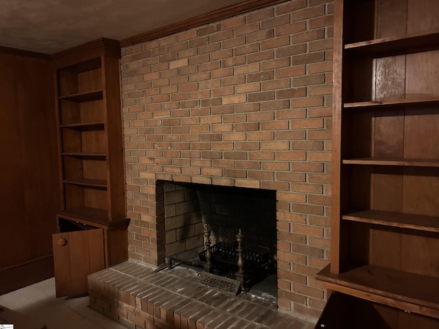 402 Chestnut St, Clinton, SC 29325 - details featuring crown molding, built in features, and a fireplace