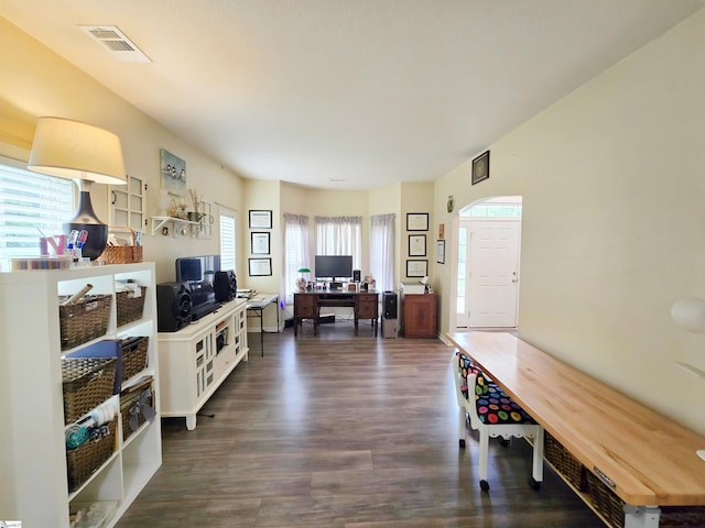 interior space featuring wood finished floors and visible vents