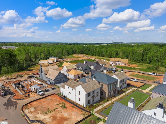 aerial view with a forest view and a residential view