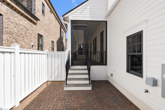 property entrance featuring fence