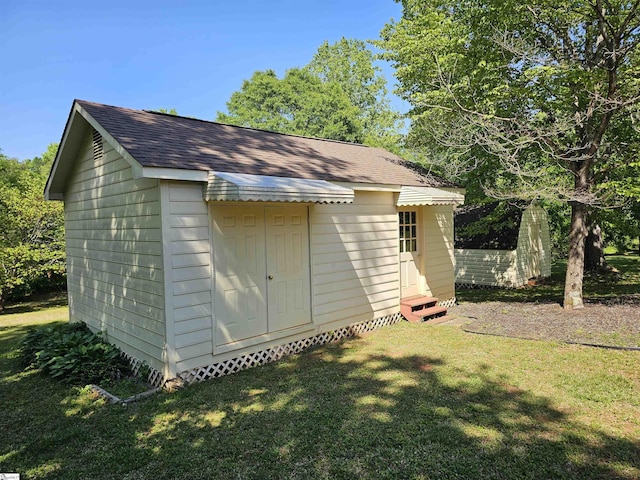 view of outbuilding with an outbuilding and entry steps