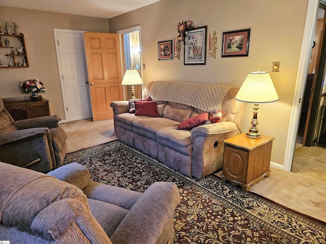 living room featuring light carpet