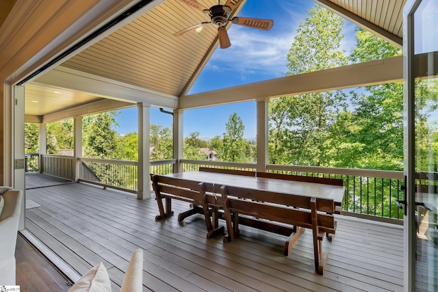 sunroom / solarium featuring ceiling fan