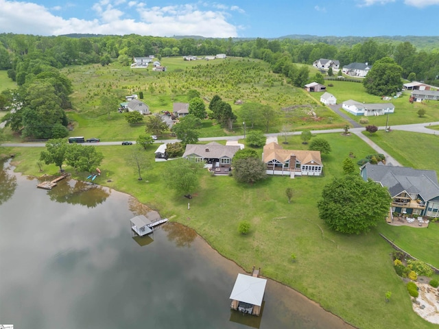 aerial view with a water view and a residential view