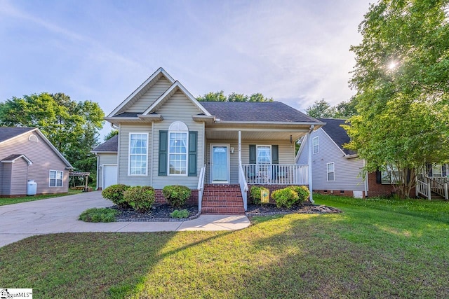 bungalow-style home with a garage, concrete driveway, a porch, and a front yard