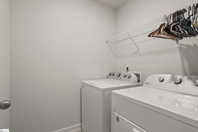 washroom with laundry area and washer and clothes dryer