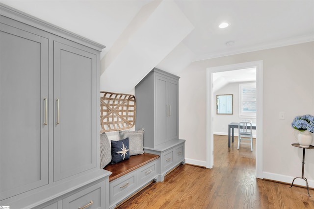 mudroom with baseboards, recessed lighting, light wood-style floors, and crown molding