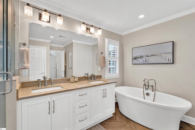 full bathroom with recessed lighting, a sink, and a freestanding bath