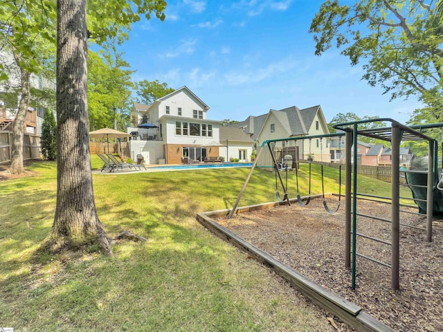 exterior space with a lawn and fence