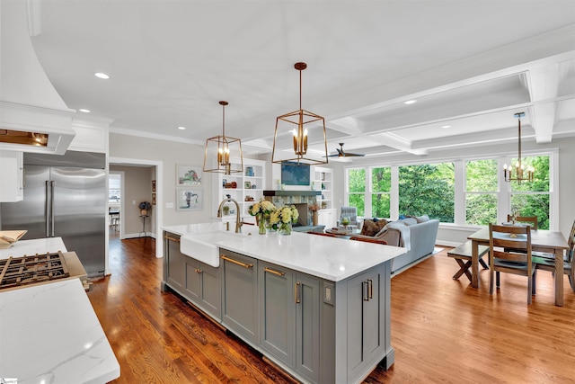 kitchen featuring a sink, gray cabinets, recessed lighting, stainless steel built in fridge, and coffered ceiling