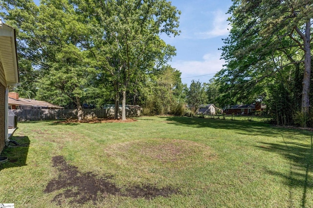 view of yard with fence
