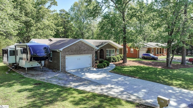 ranch-style house featuring an attached garage, concrete driveway, a front lawn, and brick siding