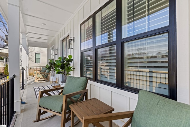 sunroom / solarium featuring plenty of natural light