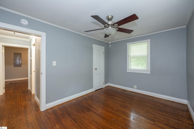 unfurnished room with baseboards, wood finished floors, and visible vents