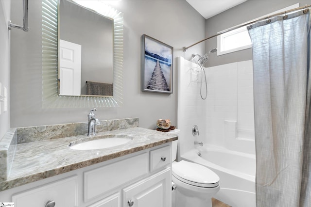 bathroom with vanity, toilet, and shower / bathtub combination with curtain