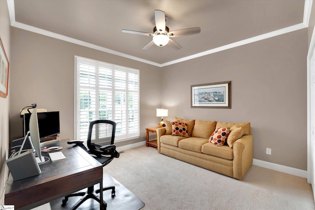 office featuring carpet floors, crown molding, baseboards, and ceiling fan