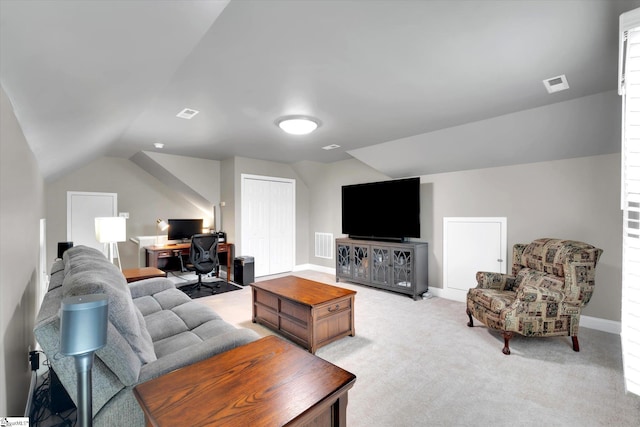 living area featuring visible vents, baseboards, vaulted ceiling, and light carpet