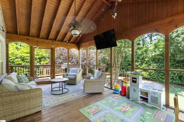 wooden terrace featuring an outdoor hangout area