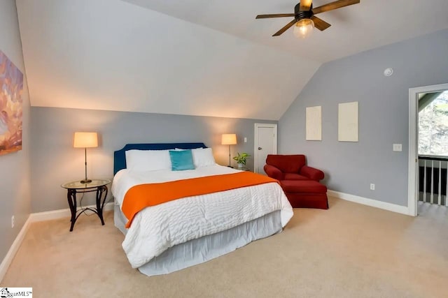 carpeted bedroom featuring baseboards, ceiling fan, and vaulted ceiling