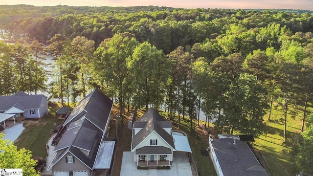 aerial view with a wooded view