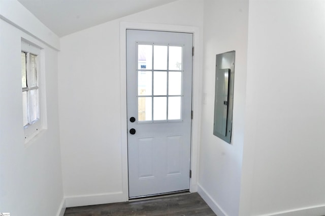 entryway with dark wood-style flooring and baseboards