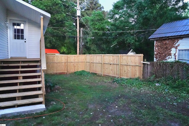 view of yard featuring a fenced backyard