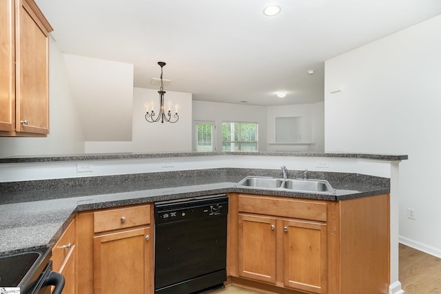 kitchen featuring stove, a chandelier, a sink, light wood finished floors, and dishwasher