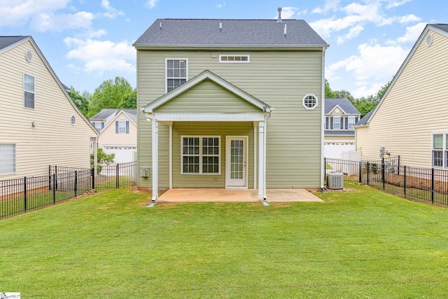 back of house with a lawn, a patio, central AC unit, and a fenced backyard