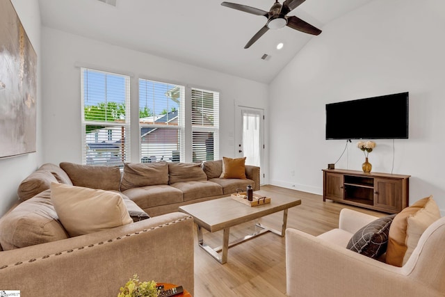 living room with visible vents, high vaulted ceiling, recessed lighting, a ceiling fan, and light wood finished floors