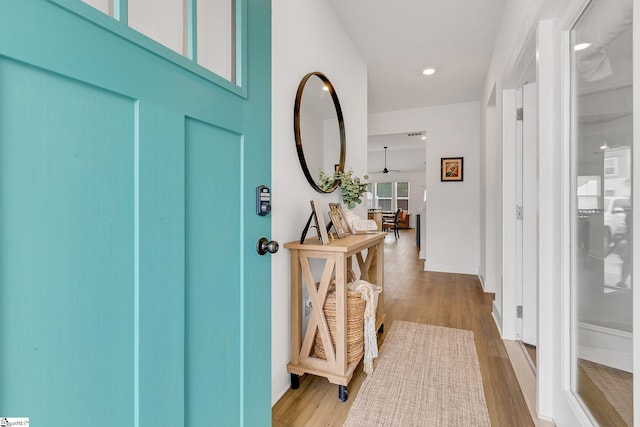 entryway featuring ceiling fan, recessed lighting, and wood finished floors
