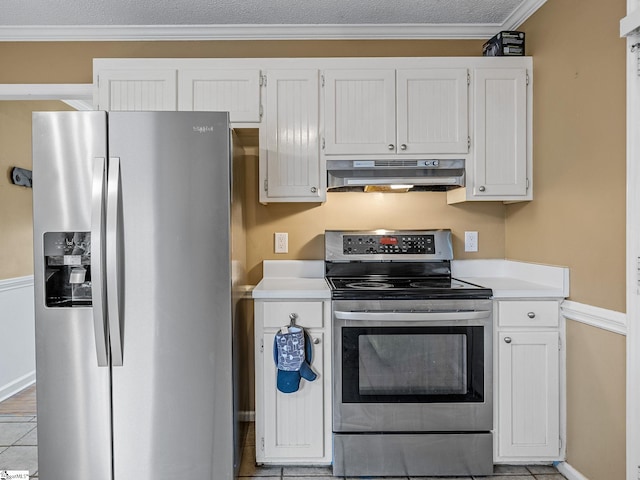 kitchen with baseboards, light countertops, under cabinet range hood, white cabinets, and appliances with stainless steel finishes