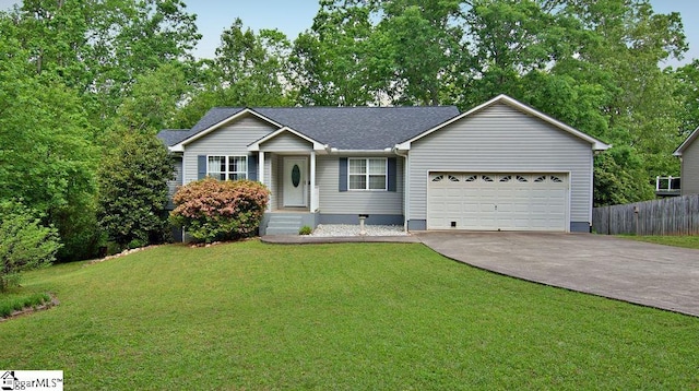 single story home featuring fence, an attached garage, a front lawn, crawl space, and concrete driveway
