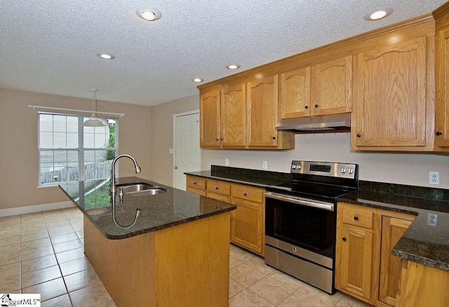 kitchen with a sink, stainless steel range with electric stovetop, light tile patterned floors, and under cabinet range hood